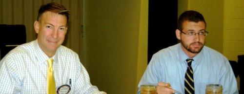 Steve Kilpatrick introduces a potential new member to the Northlake Rotary Club.jpg